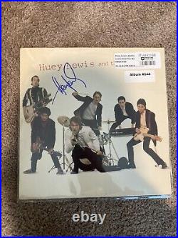 Huey Lewis And The News Signed Album Cover