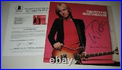 TOM PETTY Signed DAMN THE TORPEDOES LP ALBUM COVER with Beckett LOA